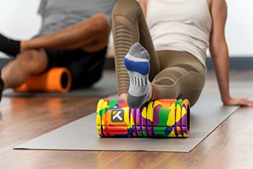 TriggerPoint Grid Foam Roller – Multi-Density Foam Surface, Firm Compression for Muscle Recovery, Pre/Post Workout Massage, Hollow Core, Trusted by Professionals, Free Online Videos, 33cm, Rainbow